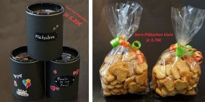 Schwarze Geschenkdosen mit bunten Aufdrucken, daneben ein durchsichtiger Beutel mit Keksen, der mit einem bunten Band verschlossen ist. Ideal für Geschenke oder besondere Anlässe.